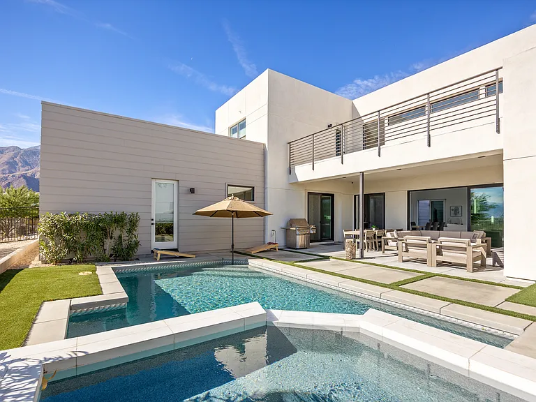 This home offers many en-suite bedrooms with stunning mountain views.