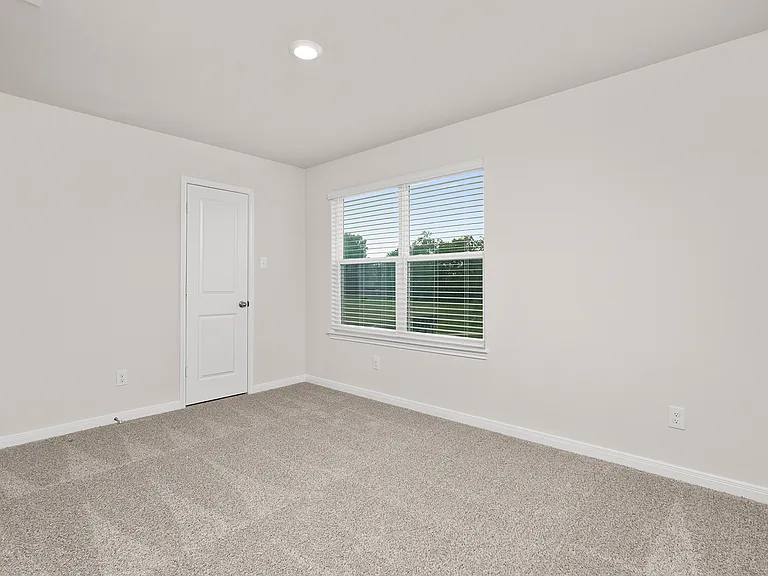 The secondary bedrooms are a great space for a children's bedroom, guest room, or home office.