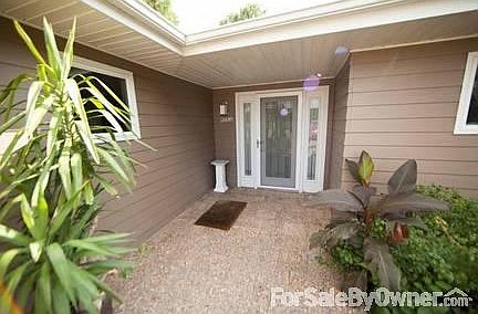 Back exterior facing river