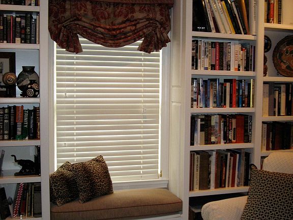 Bedroom/Office. Built-in desk, cabinetry, bookshelves. Sisal carpet.