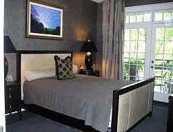 Custom wallcovering, carpet, California Closets and French Doors to Balcony with Piedmont Park Views!