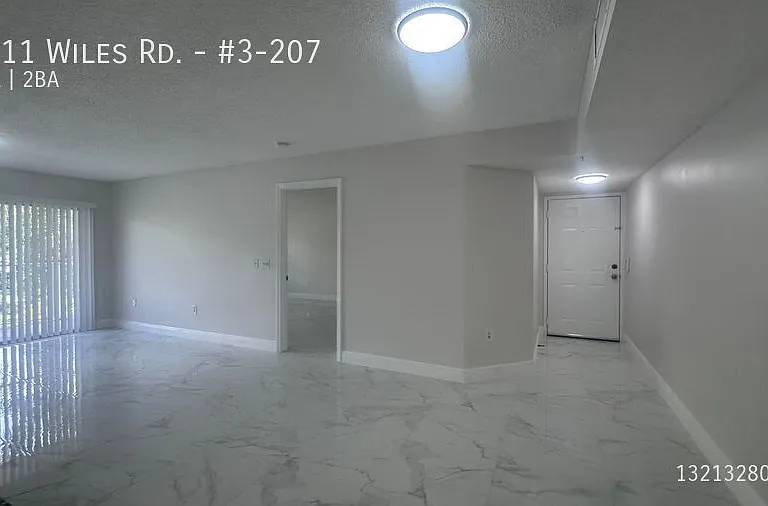 5011 Wiles Rd #3-207 — Photo 33