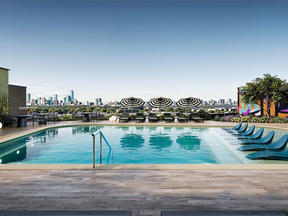 Experience ultimate relaxation with breathtaking city views at this upscale rooftop pool.