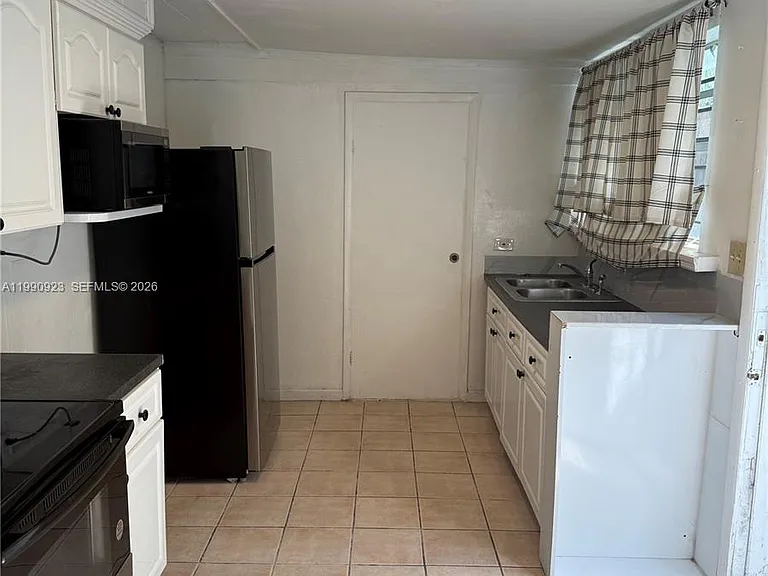 1230 NW 180th Ter #1 — Photo 3