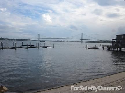 View from beach
						:
						Whitestone Bridge and City Skyline