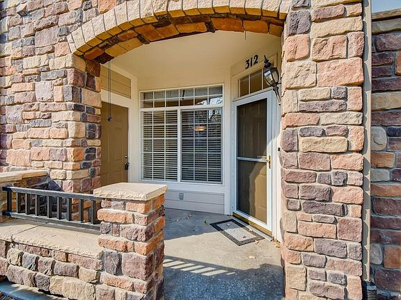 Front entrance/patio with outdoor storage