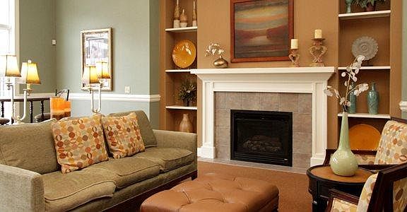 Clubhouse area with cozy fireplace and comfy seating.