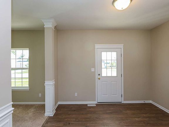 Flex room off of the large, open foyer.
