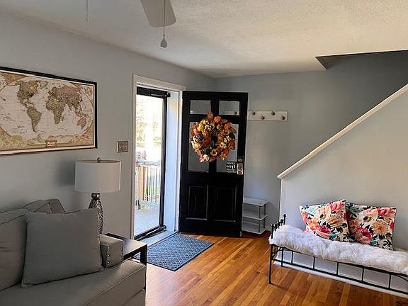 Main entry way with storm door.