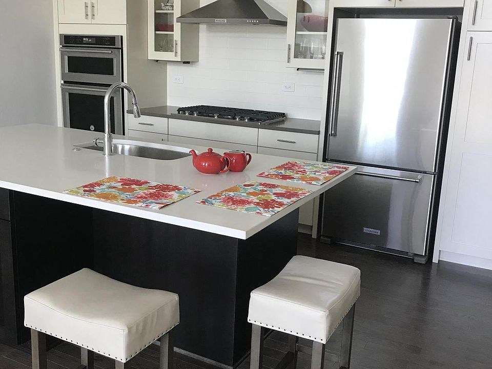 Gourmet Kitchen with Quartz countertops. Comfortable island