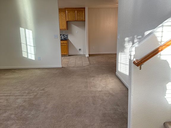 Living room and dining room in the distance
