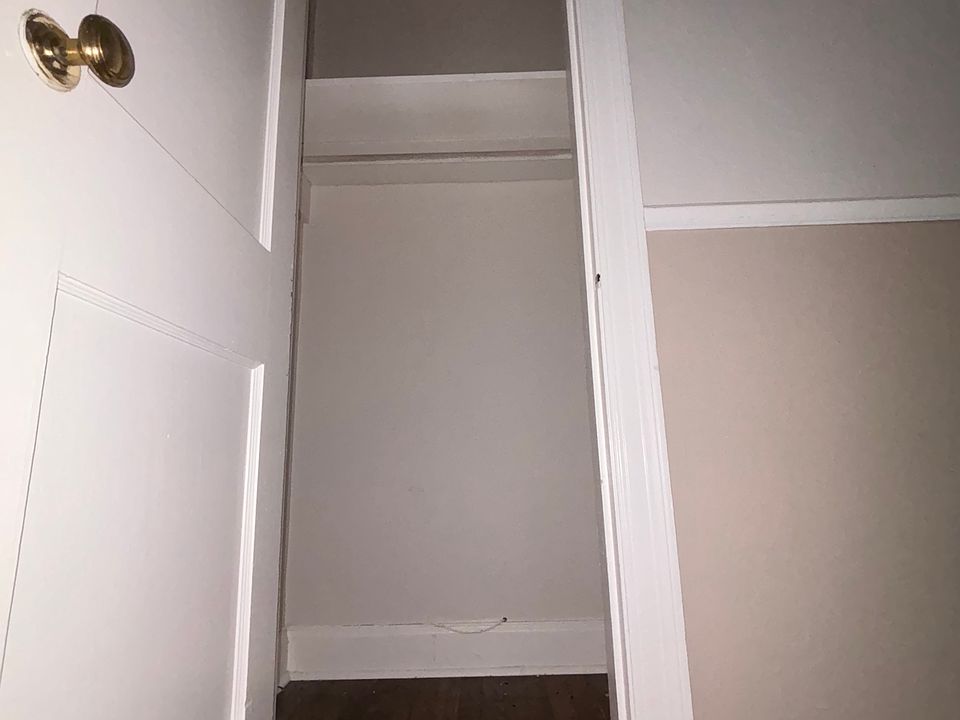 Living room closet/storage by front door