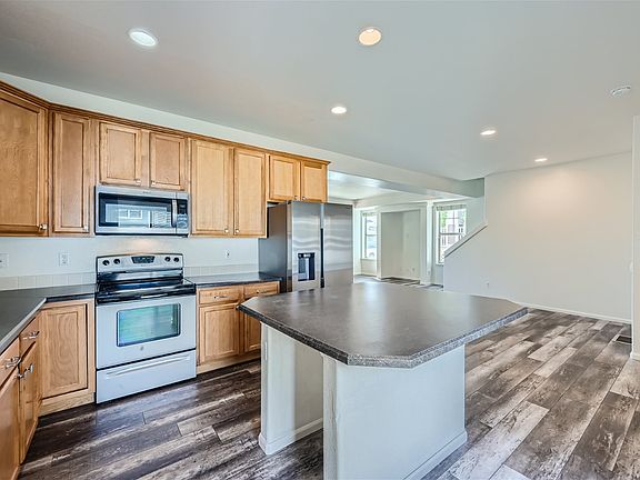 4th image of 9459 E 109th Ave