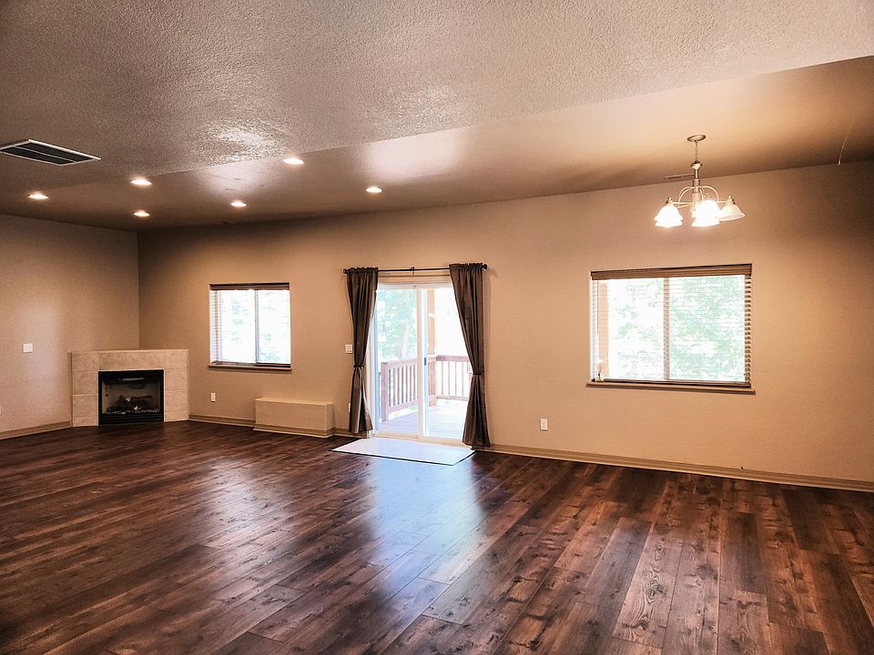 Room is 32 ft X 18 ft, not including kitchen