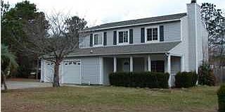 The view from the front of this spacious colonial style home.