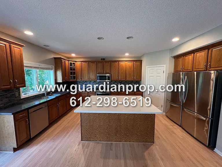 7303 Hidden Valley Ln S — Photo 6