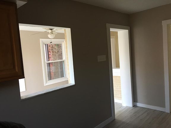 Kitchen looking into sunroom