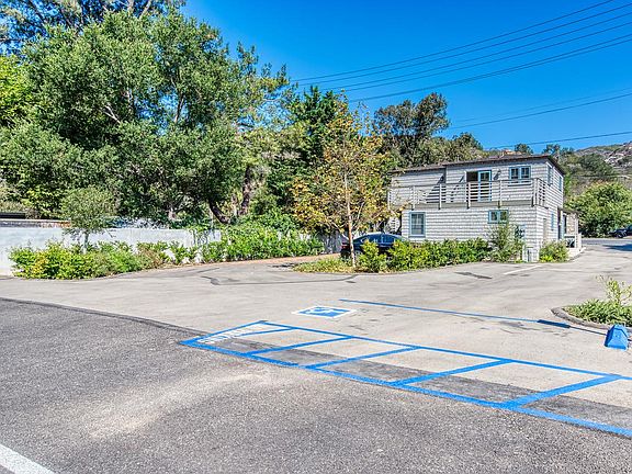 Exterior of property. 
2 dedicated parking spaces are included.