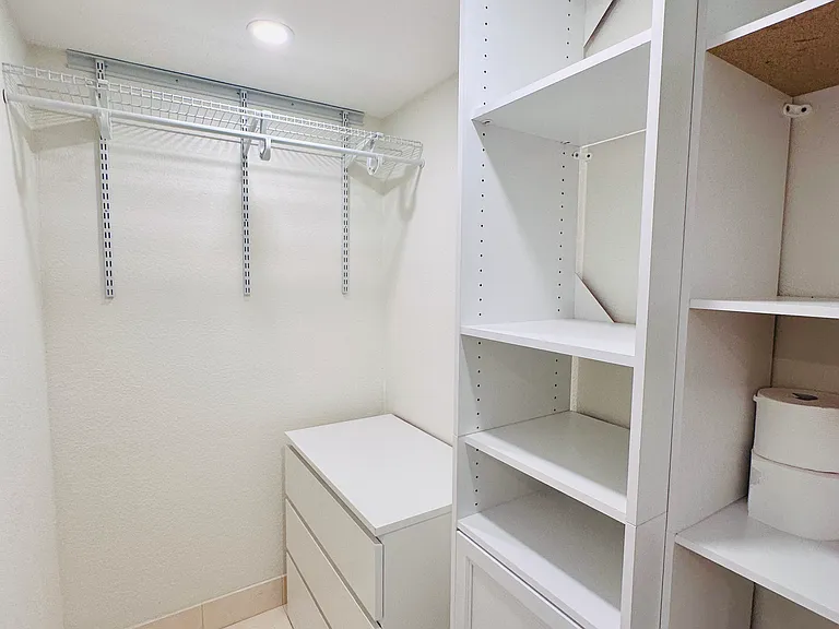 One of the walk-in closets