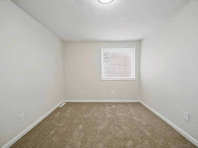 Secondary Bedroom Window (front of house street view)