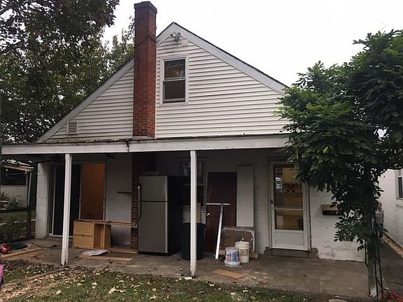The house is currently being entirely remodeled, but this porch will be cleared off and will look great by move in.