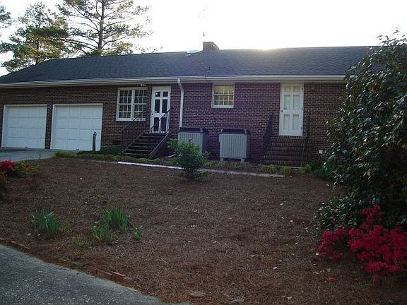 Back view with attached garage
