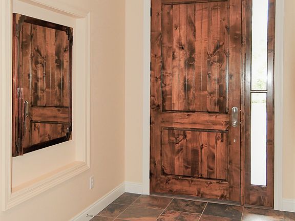 FRONT FOYER W/ MIRROR