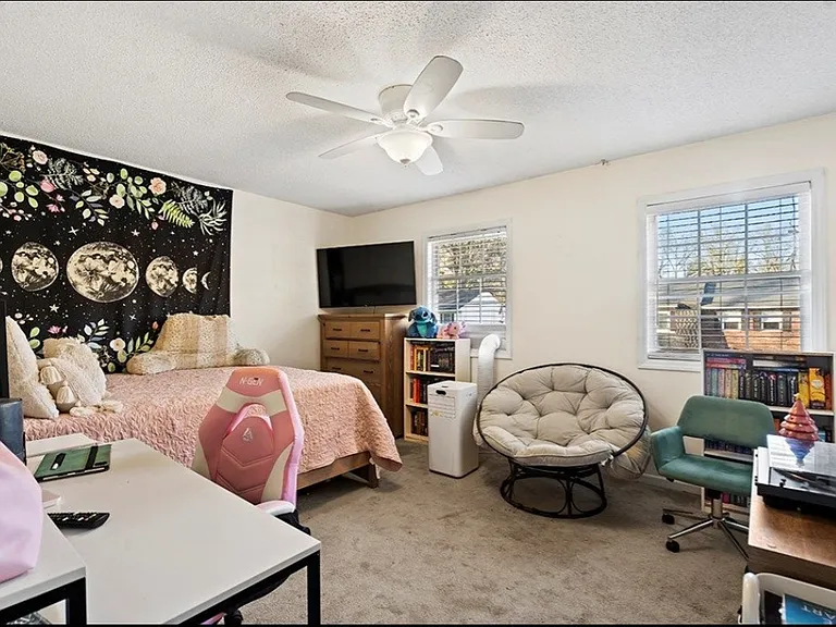Second bedroom with queen bed. Some decor has changed.