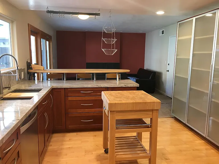 Kitchen with view into family room
