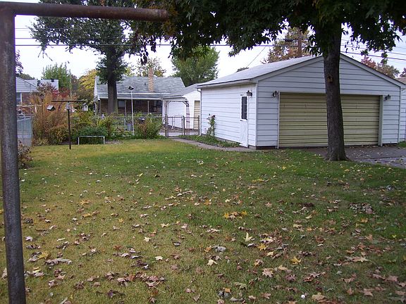 partially fenced back yard