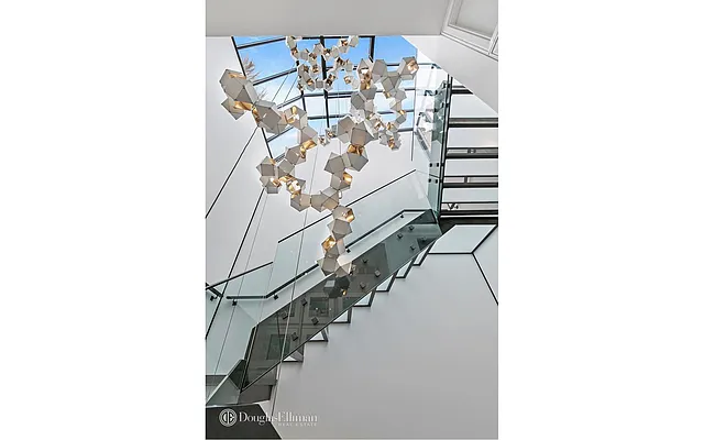 Sold by Douglas Elliman | media 13