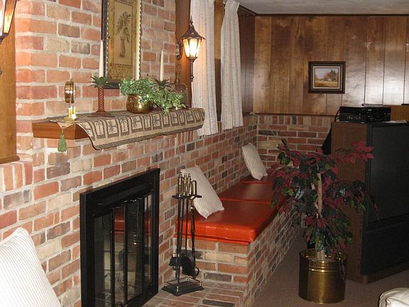 Fireplace with storate benchs