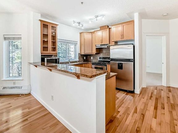 5th image of 20 W Discovery Ridge Close SW #203