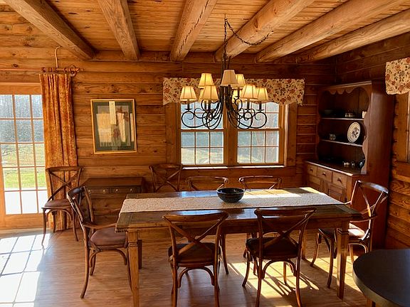 Dining, seats * and has pull out extensions on table.