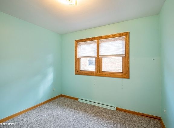 5th image of 5143 N Kenton Ave