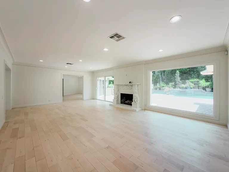 Expansive open floor plan connects the living areas seamlessly in this Beverly Hills luxury rental home at 1094 Garden Lane, perfect for a 90210 lease.