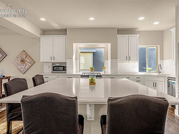 4th image of 8674 Tranquil Knoll Ln