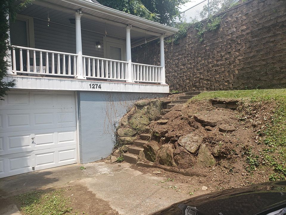 I just had a landscaper come and remove weeds and bush in front of house due to a tree growing in it. Will be working on landscaping so it will not stay looking this barren.