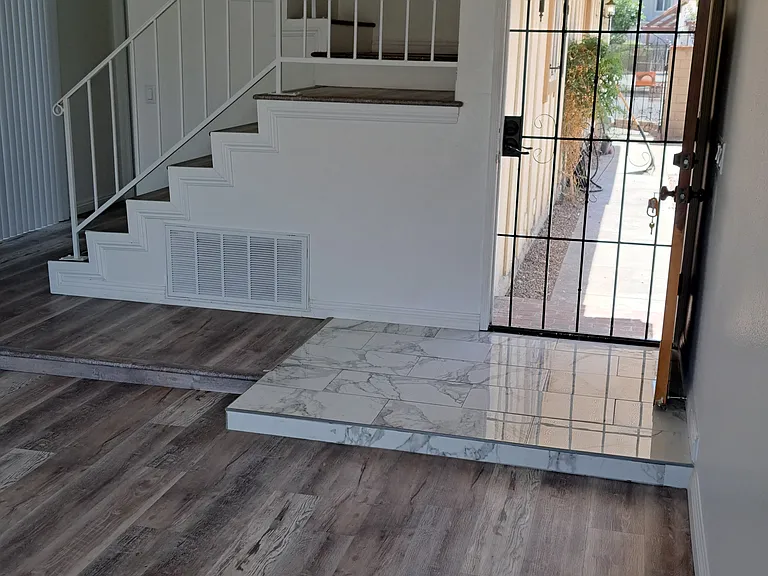 Stairs to Second floor and entry door