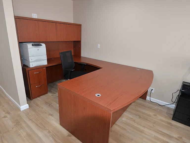 Executive desk in MBR (we can leave this here, relocate to another room or remove it altogether)