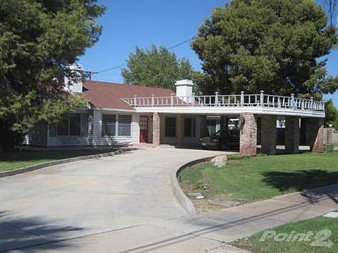 Front side view of house and front yard