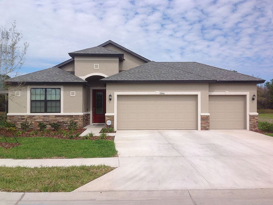 Sanibel - 3-Car Garage with Stone Accent