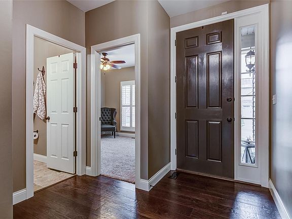 Entry foyer with two bedrooms and full bath