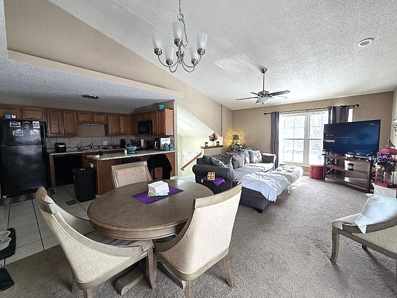 Open-concept layout with excellent natural light and ceiling fan for comfort.