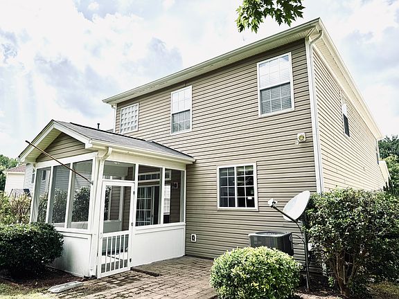 Screened In Porch with Patio Pad for grilling