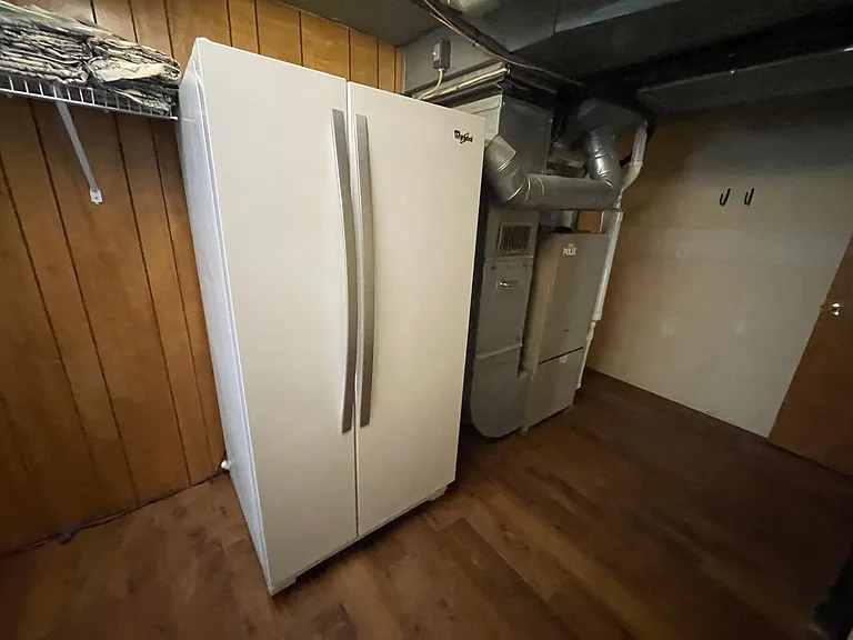 Laundry room includes a second 25 cu.ft. Refrigerator