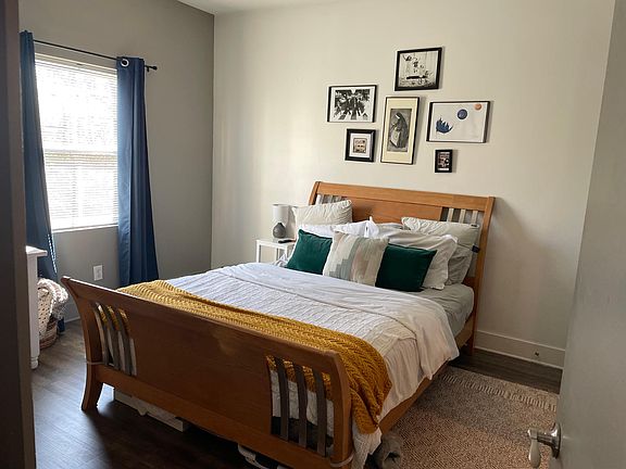 Bedroom (closet available on 3D tour) each bedroom in all units are basically identical, they have a closet and bathroom. 2bdroom units have hardwood floors, 4 bedroom units have finished concrete floors and hardwood