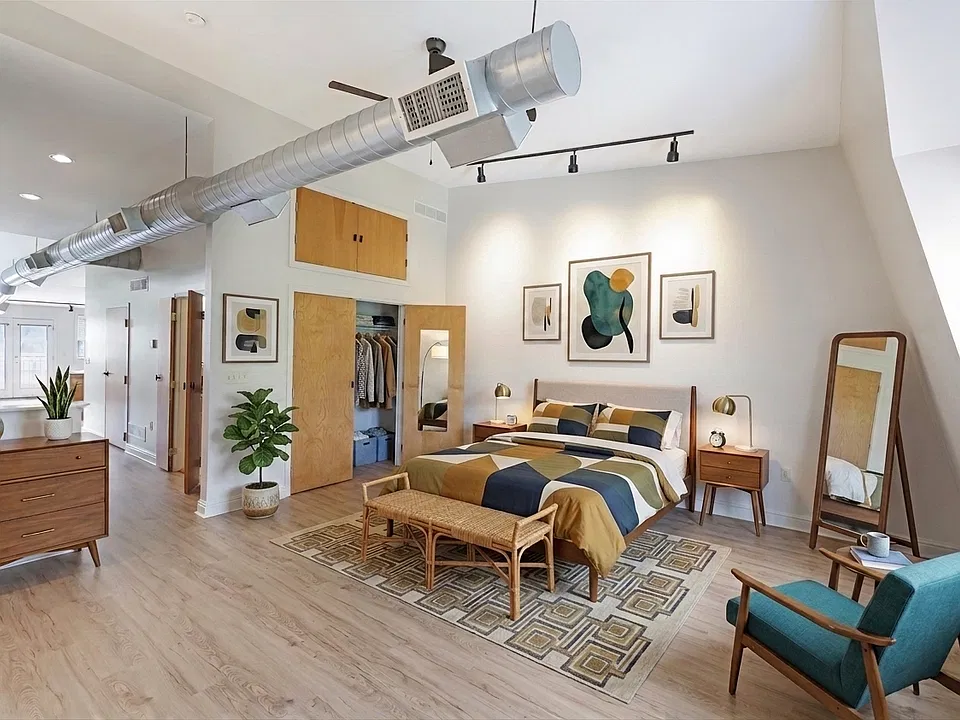 Enjoy a spacious bedroom with plenty of storage.
