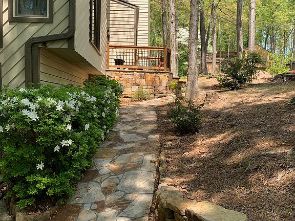 Stone walkway to front porch entrance.