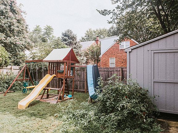 Back yard (swing set not included, but she